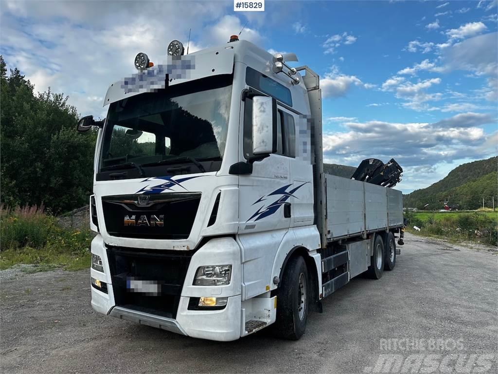 MAN TGX 26.560 Flatbed truck with Hiab 138 crane from  Φορτηγά Kαρότσα με ανοιγόμενα πλαϊνά