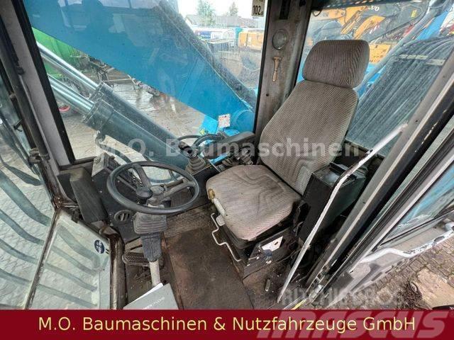 Fuchs MHL 331 / ZSA / AC / Hochfahrbare Kabine / Εκσκαφείς με τροχούς - λάστιχα
